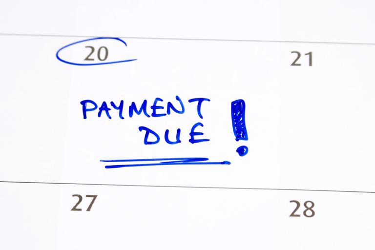 calendar entry with date circled, saying "payment due"