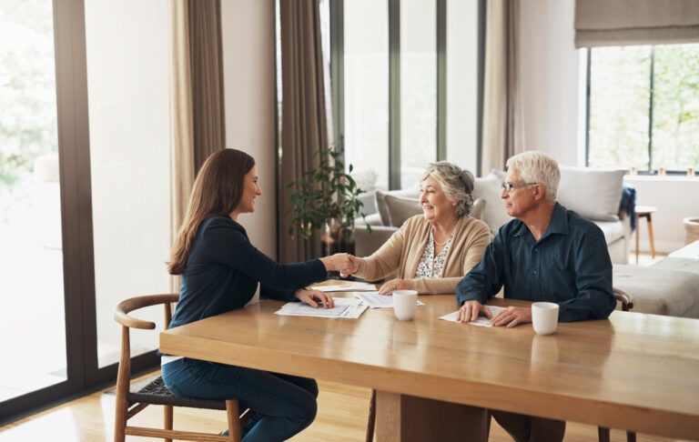 Older couple meeting with financial advisor