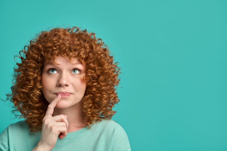 Young woman with questioning face