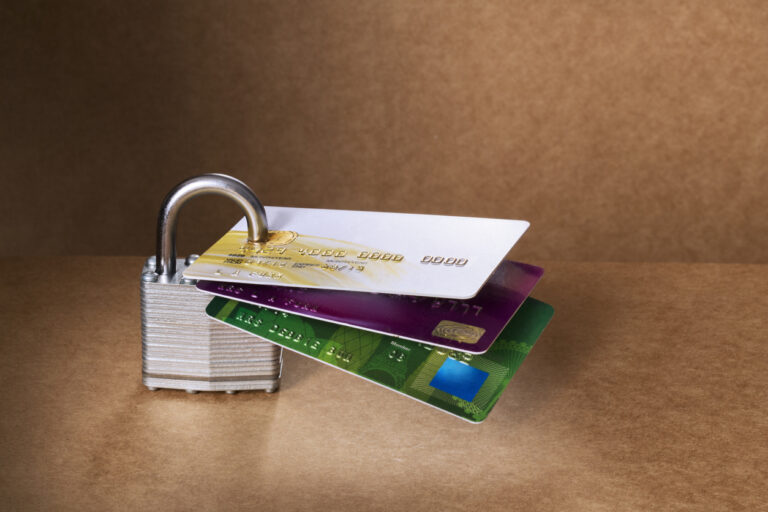 Credit cards attached to padlock