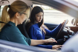 Teenage girl learning to drive