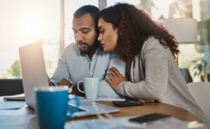 young couple looking at life insurance options