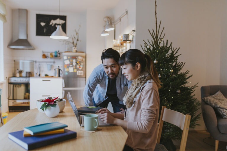 couple at table looking at home equity options for their financial needs