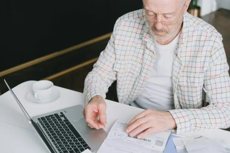 Man looking at debt and pension