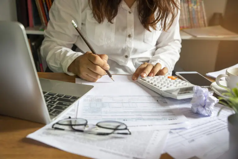 woman looking at tax refund and debt