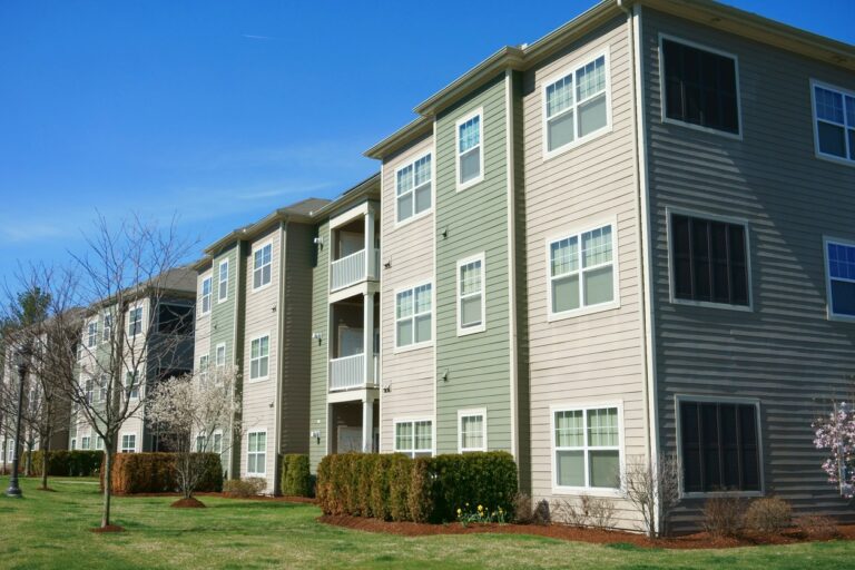 modern condo buildings in sunny day